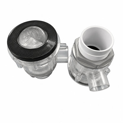 A clear plastic dual-port plumbing fitting or filter assembly with one cap removed, showing a black textured top and a white threaded interior, set against a solid blue background.