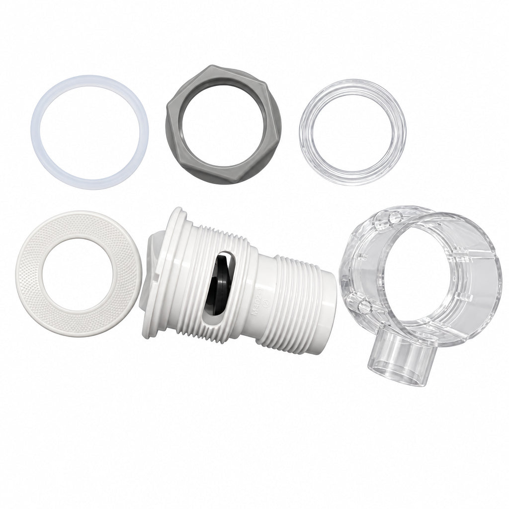 A set of replacement parts for a white plastic threaded fitting, including a white threaded body, a clear plastic collar, a gray hex nut, a clear ring, and a beige textured ring, arranged on a blue background.