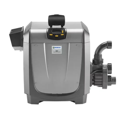 Zodiac JXi 200MJ natural gas pool heater with compact design and digital control panel installed beside a residential swimming pool