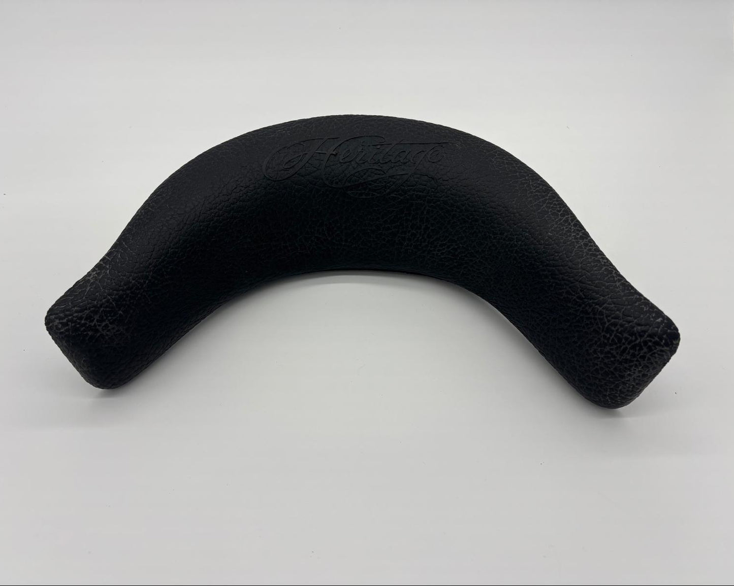 Black Heritage spa headrest designed for neck jet seating with flatƒ??top profile and centre mounting lug