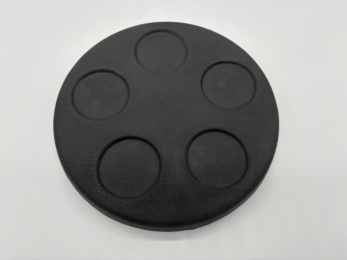 Round dark grey spa lid esky with five integrated drink holders shown from top and underside views