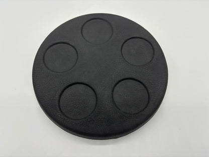 Round dark grey spa lid esky with five integrated drink holders shown from top and underside views